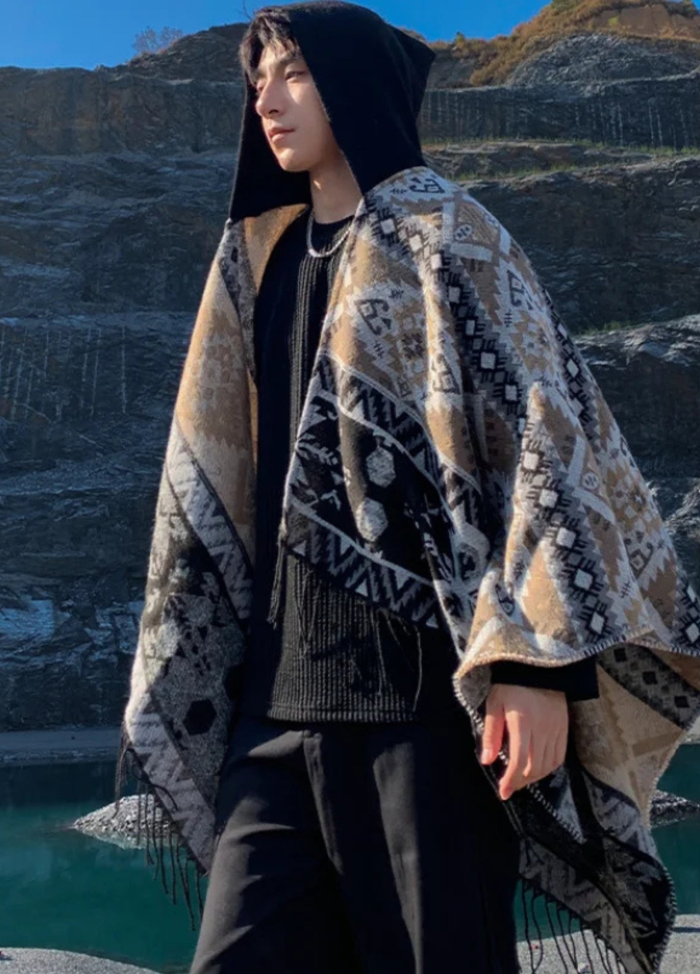 Geometric hooded poncho with tassel finish | Thorn